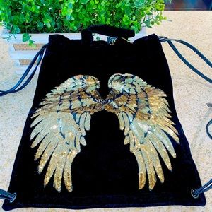 Nwt Beautiful velvet rucksack/backpack comes with storage bag